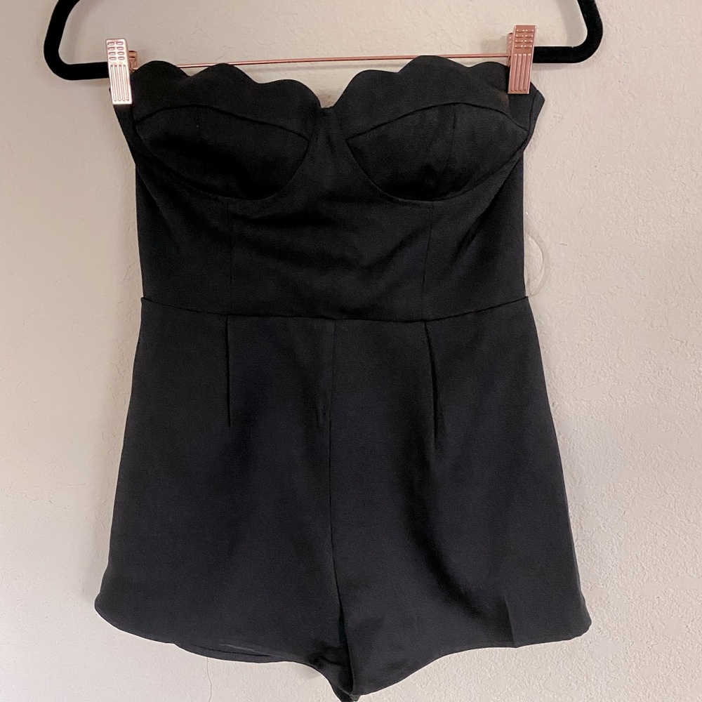 Black, sleeveless romper
